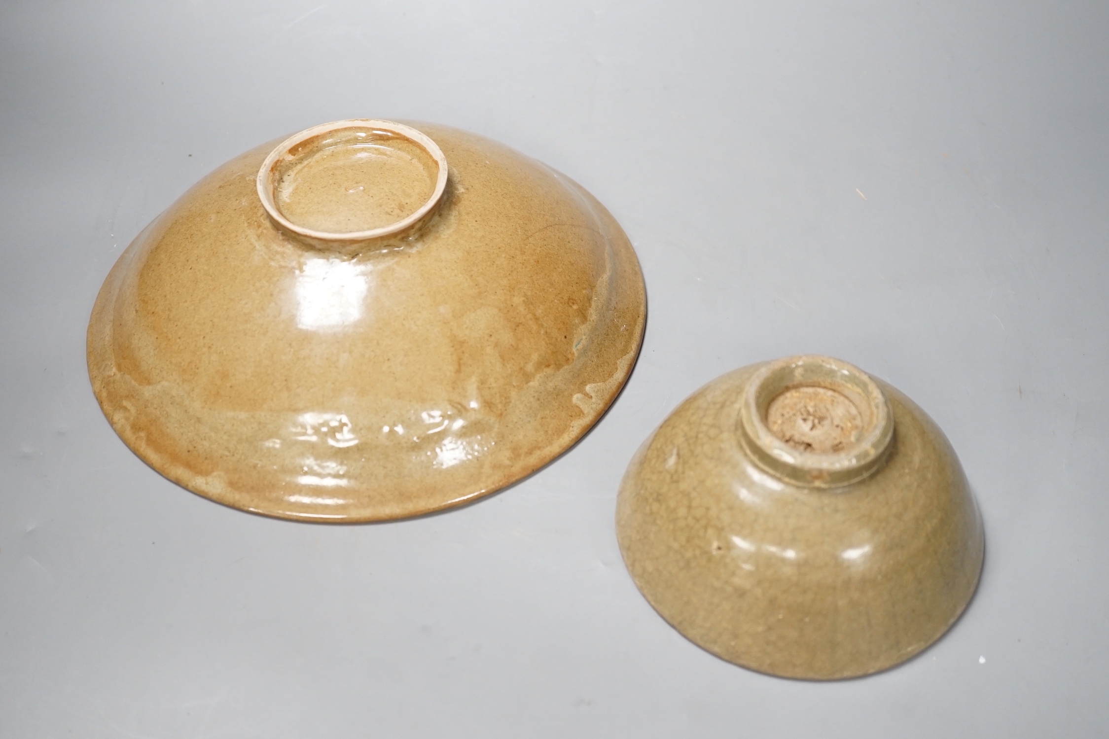 Two Chinese celadon bowls, Yuan - Min dynasty, largest 25cm